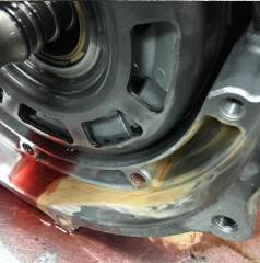 Tan liquid is Antifreeze contamination of transmission fluid When radiator leaks antifreeze into transmission fluid, it turns tan or pink